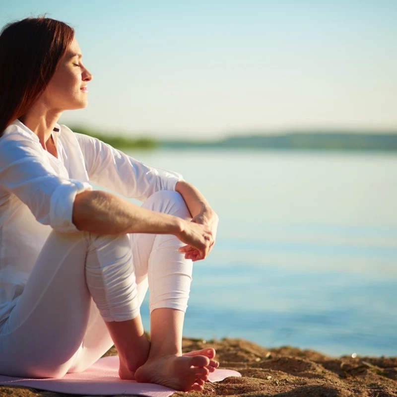 relaxed-woman-enjoying-sea.webp